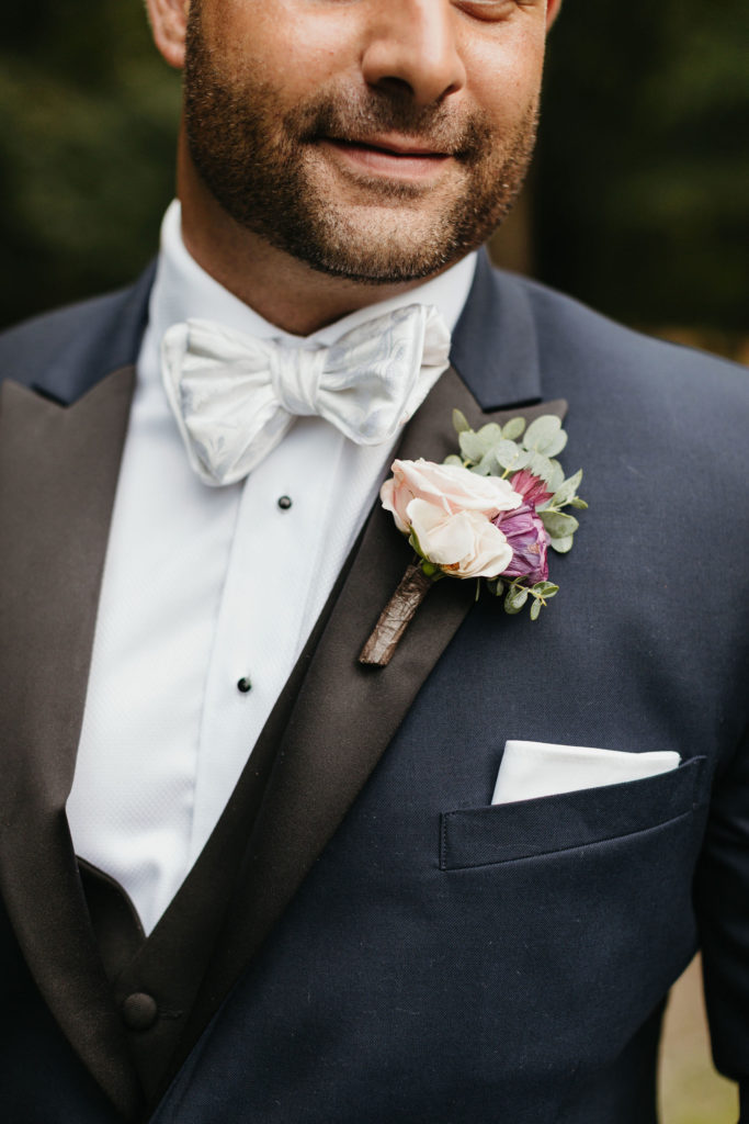 purple and pink boutonniere