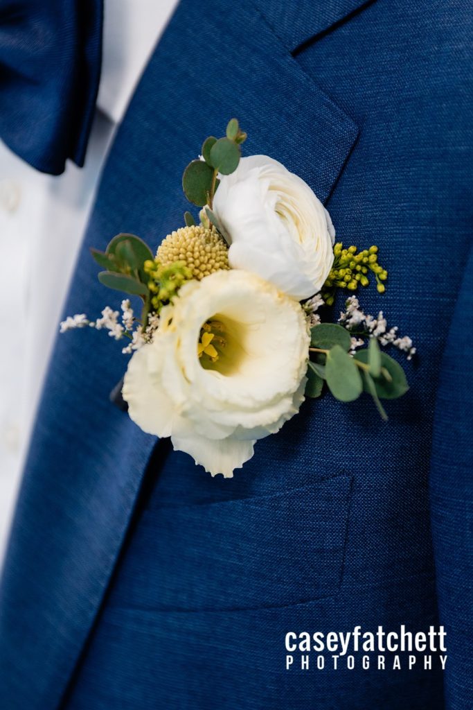textured white and yellow boutonniere