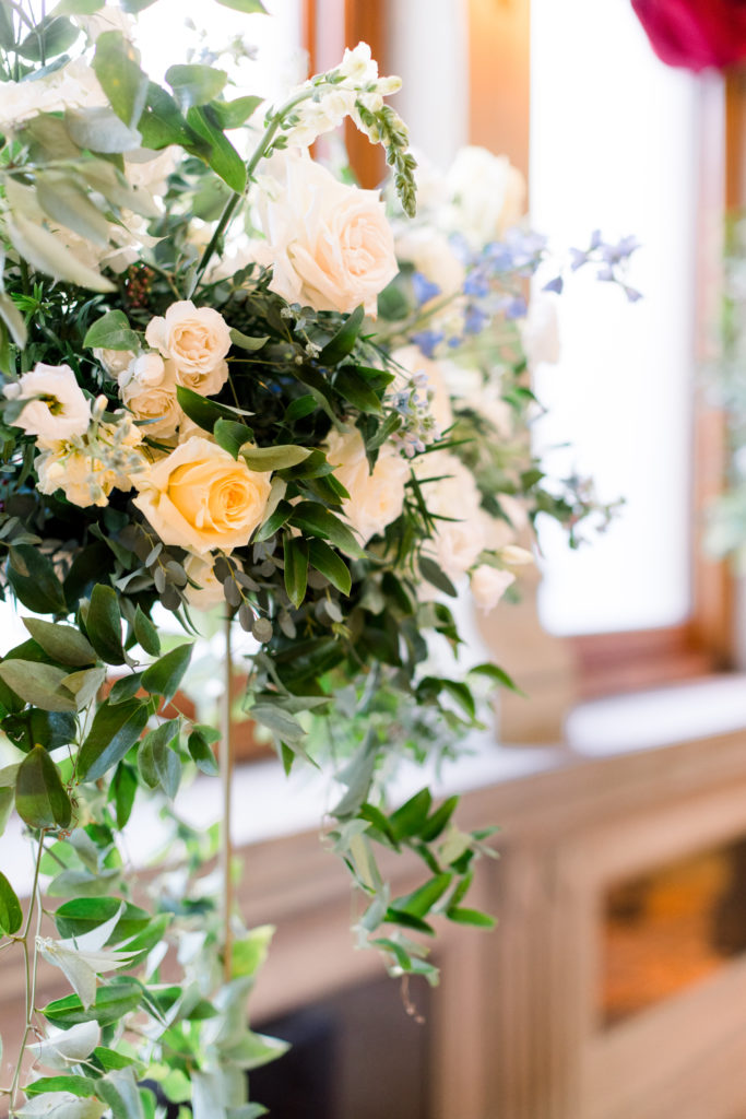 White, cream and blue floral ceremony arrangement