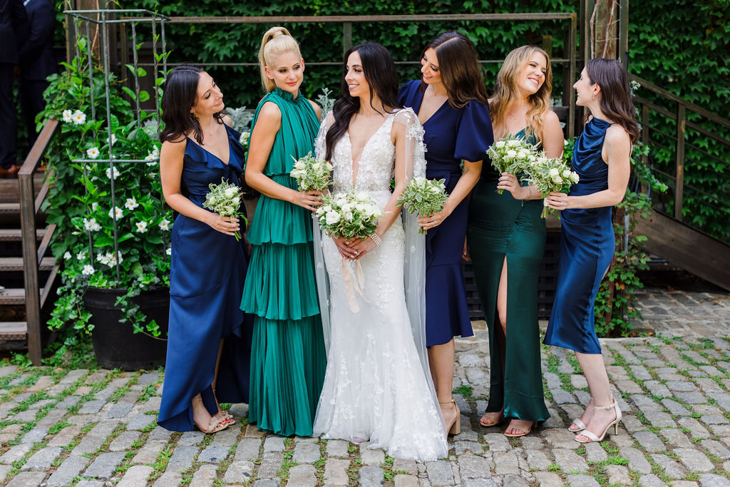 bride and bridesmaids with petite bouquets