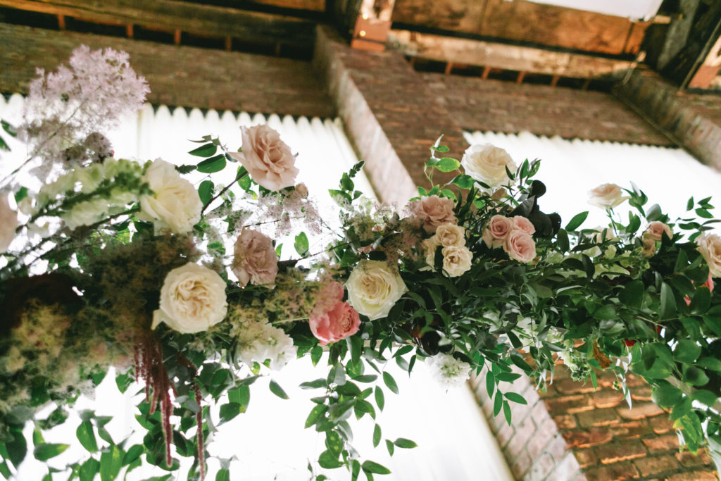 burgundy and blush wedding floral arch