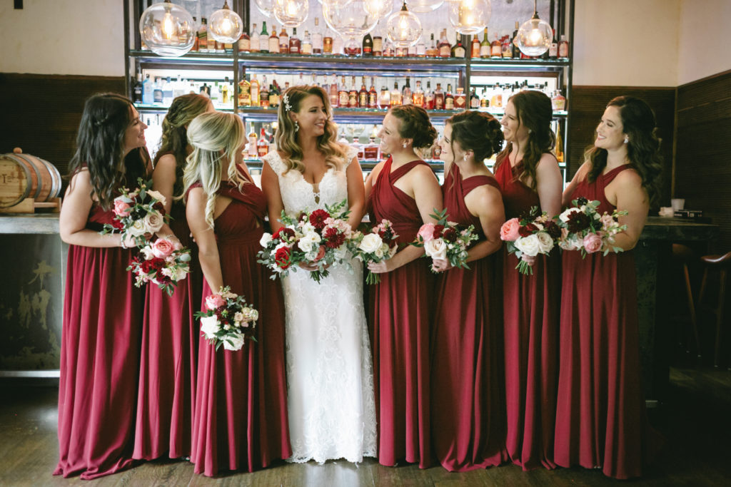 blush and burgundy bride and bridesmaids