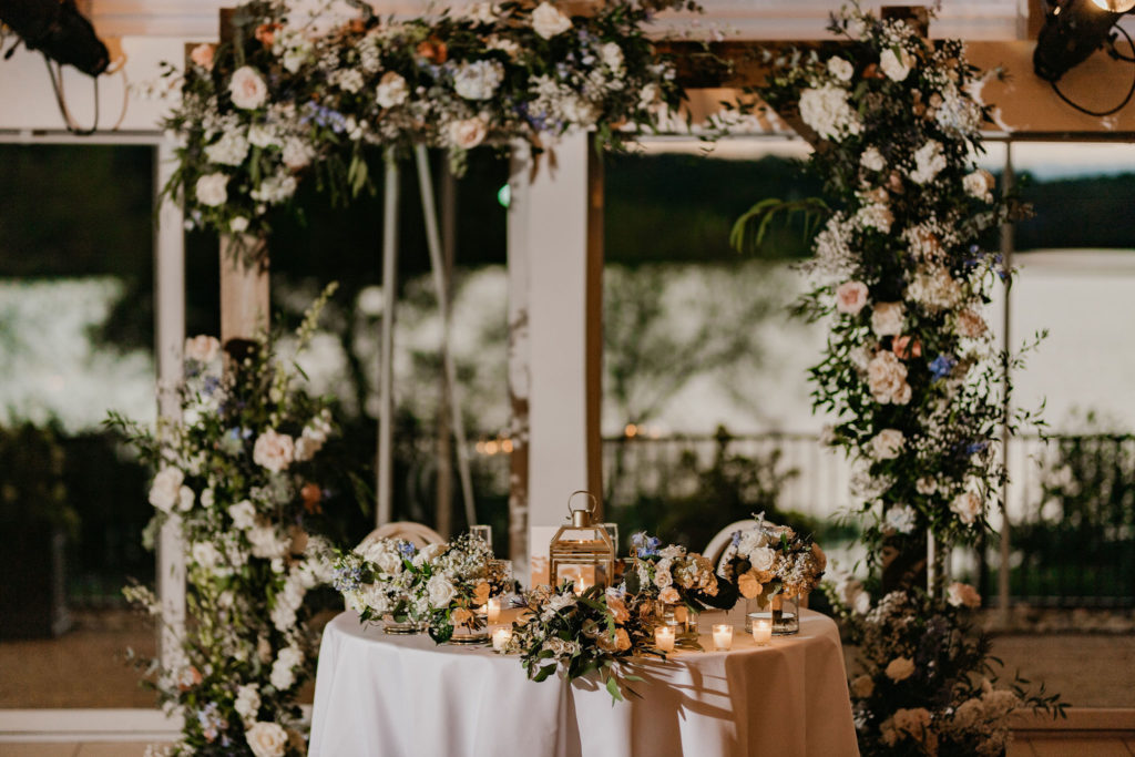 Spring wedding sweetheart table florals