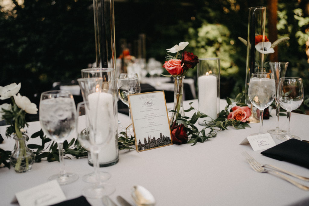Reception Florals with bud vases and candles