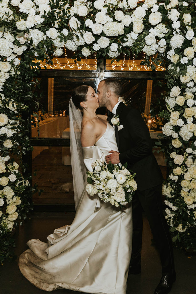 chic and elegant city wedding floral arch
