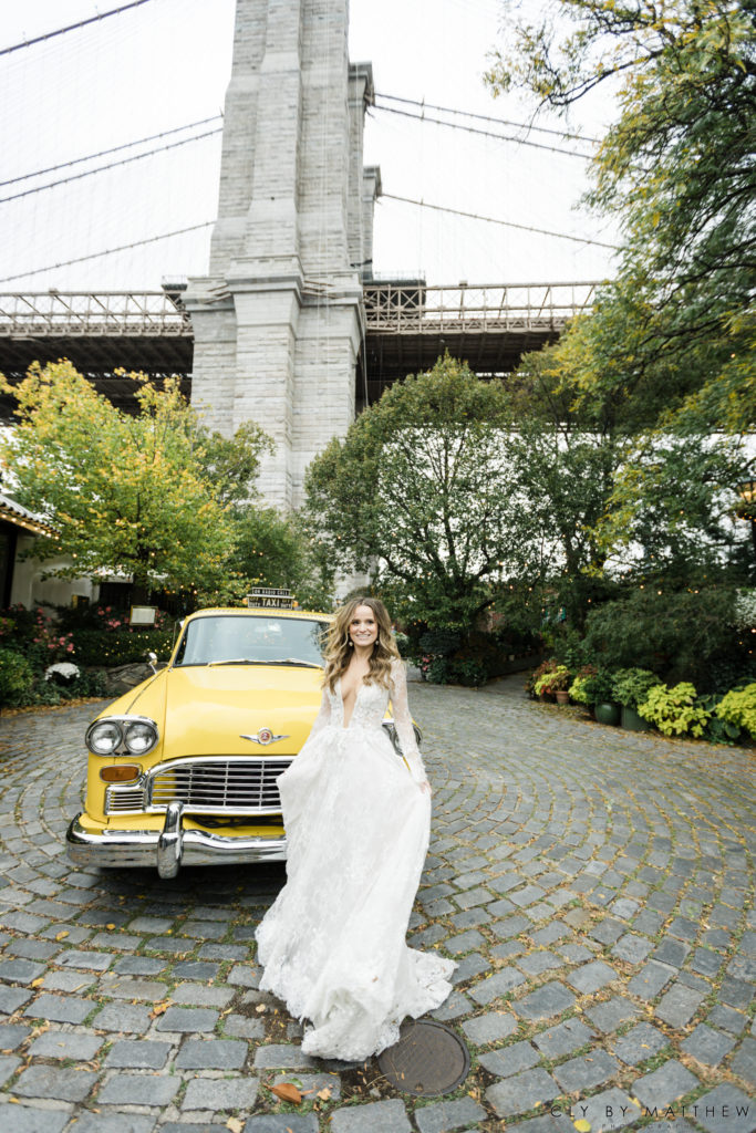 Bride with a Vintage Taxi and City View