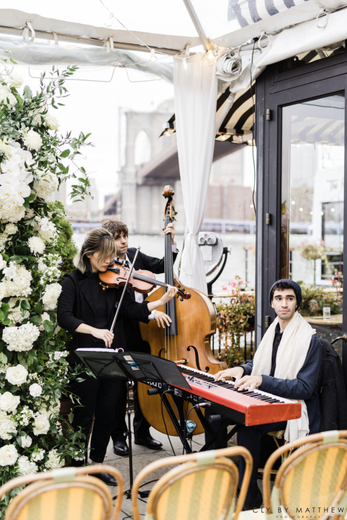 Violin Cello and Piano Playing for waterfront wedding