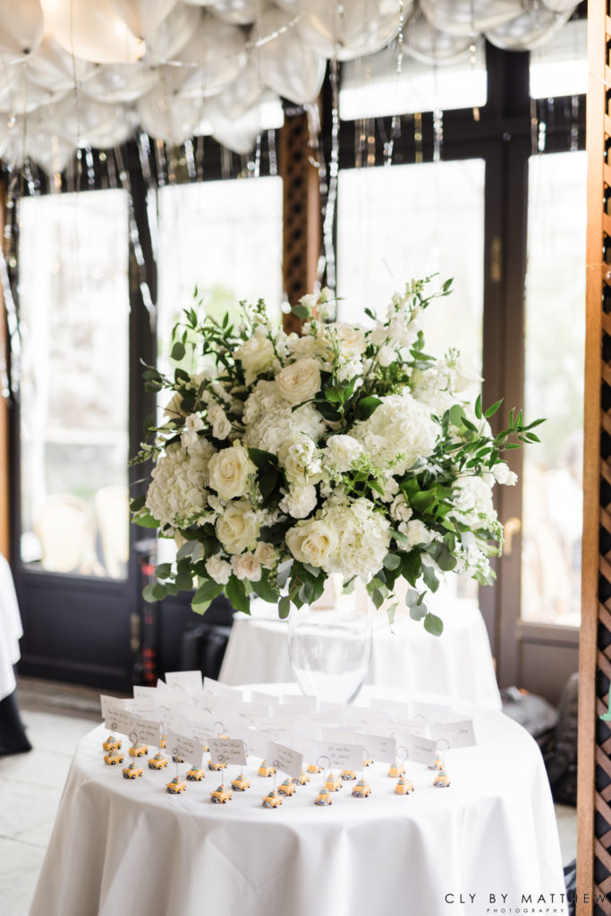 Chic White and Green Escort Table Flower Arrangement