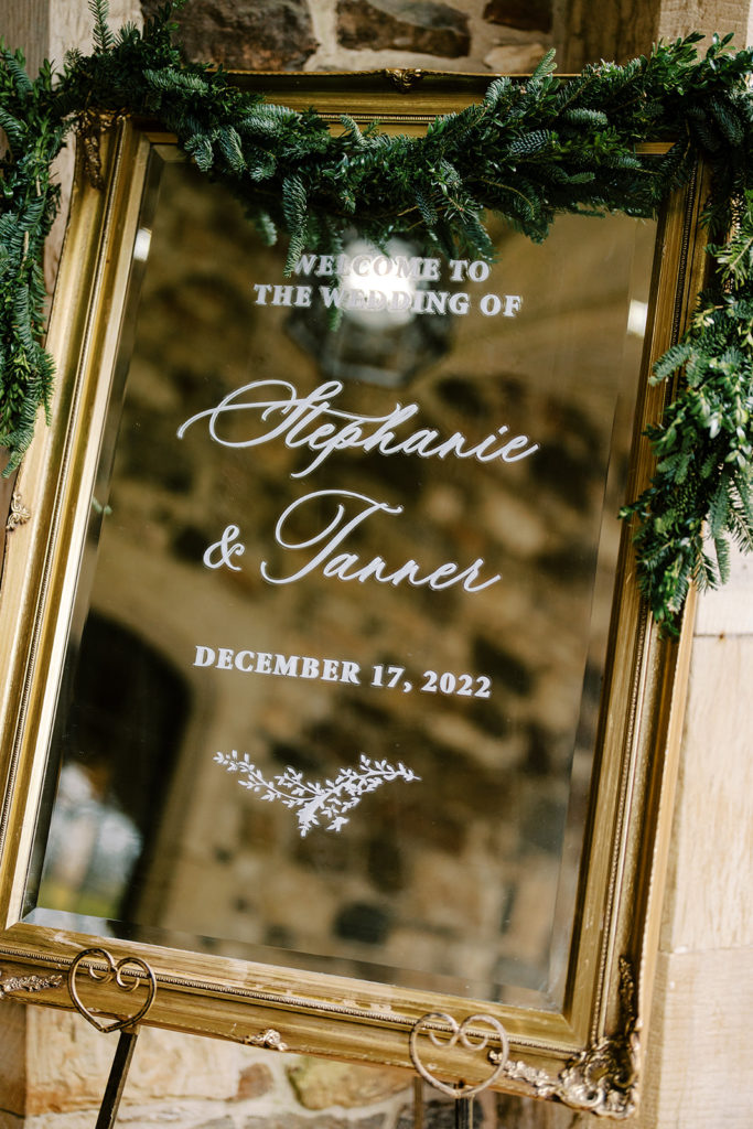 wedding welcome sign with garland
