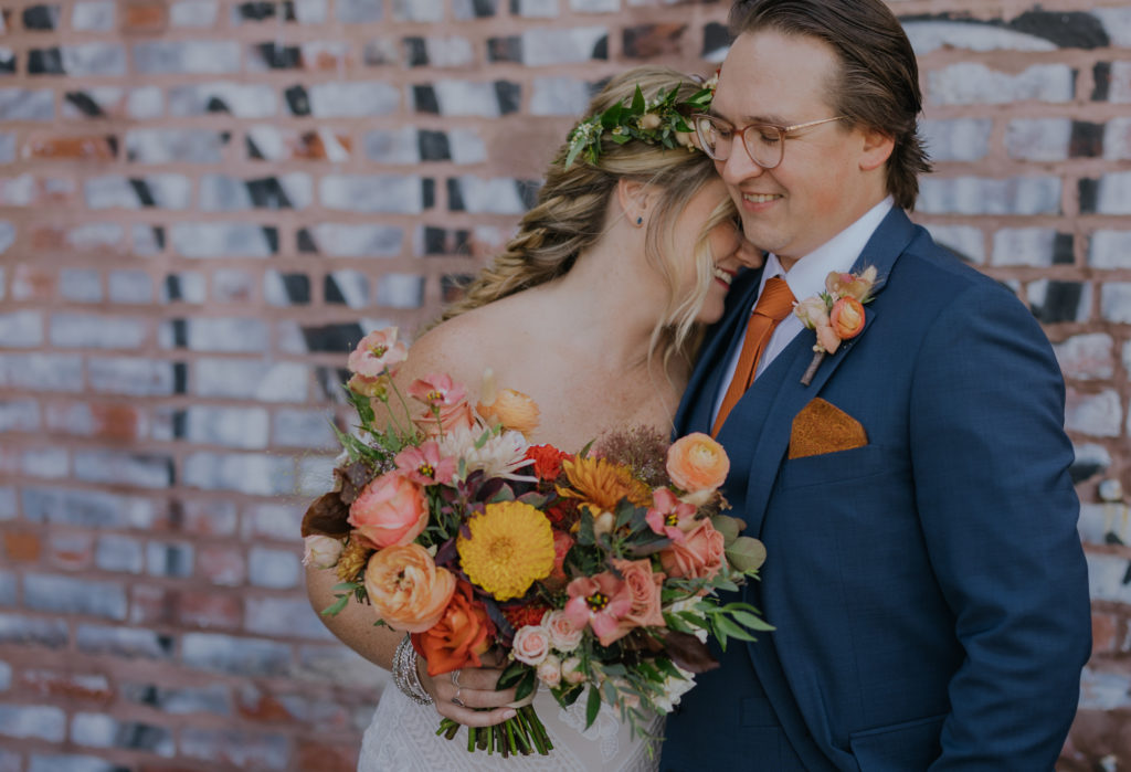 Fall bridal bouquet with dahlia, lisianthus and ranunculus