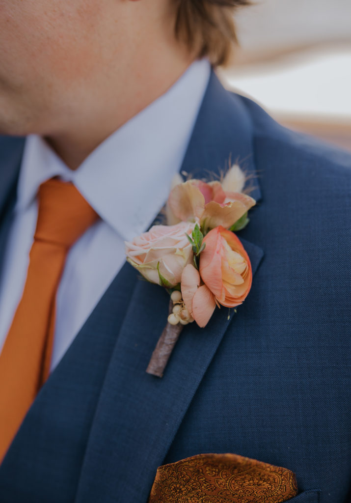 Fall Groom Boutonniere with Ranunculus and dried texture